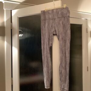 2-Lululemon grey yoga pants sz 10. 
And charcoal colored pants sz 10